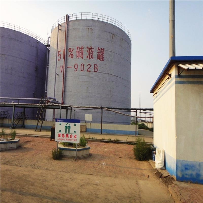 What kind of pump is used for sodium hydroxide solution transfer?